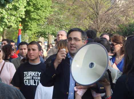 Hamparian addresses the gathered at a protest